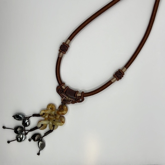 Carved Agate Infinite Knot and Tahitian Pearls with Silk woven Chain Necklace
